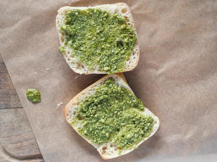 step 2: spread pesto on inner sides of bread